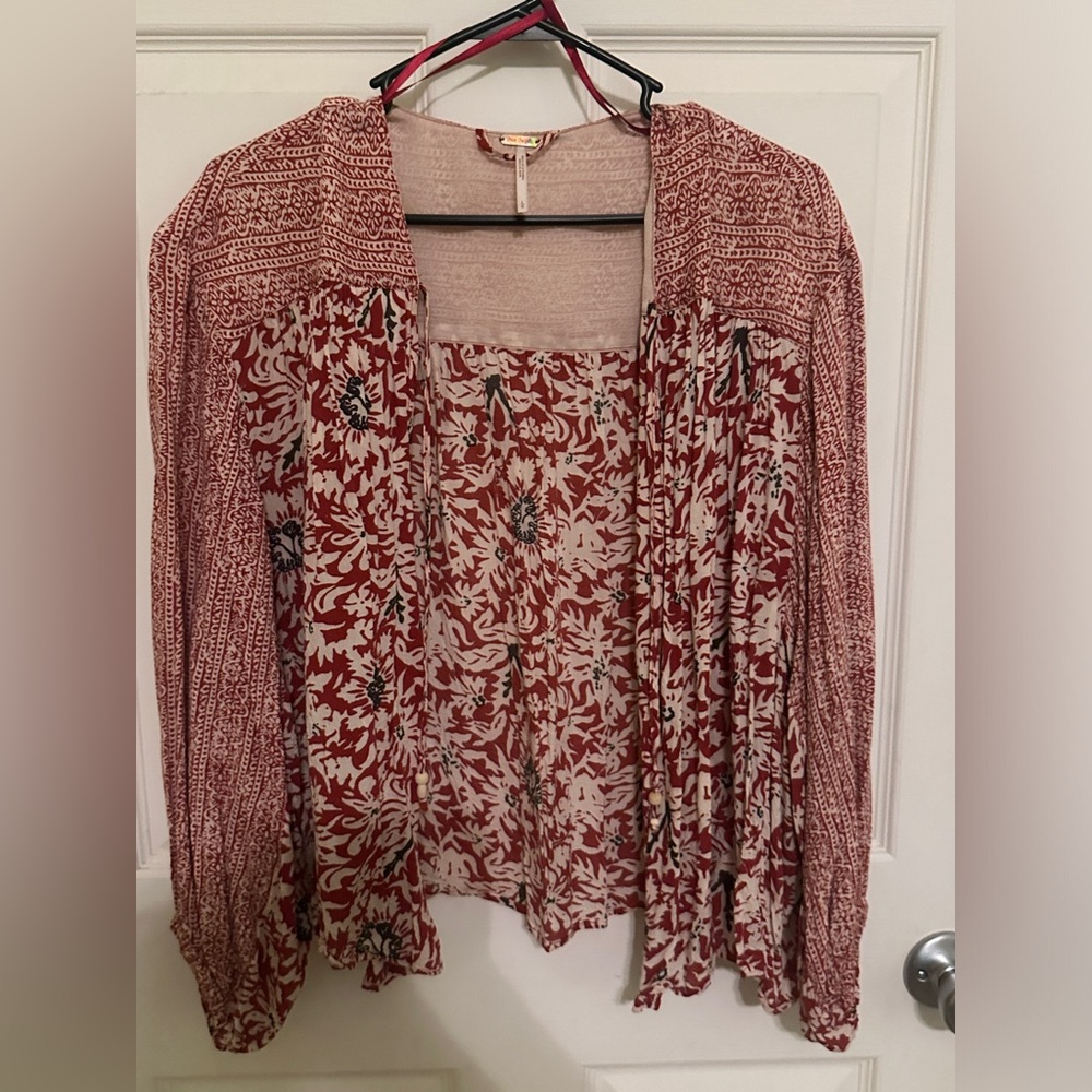 Free People blouse/light jacket. Great condition. Barely used. Size large.